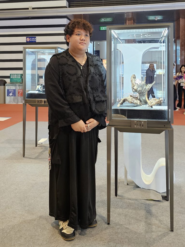 JGA 2025 - Snap Photos - Students taken pictures with their design work by media